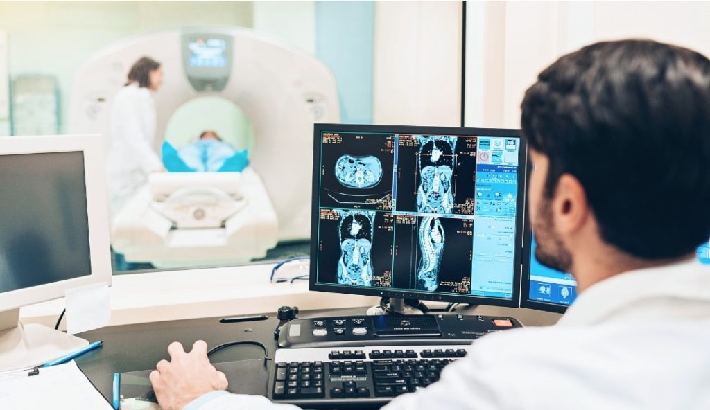 doctor doing an mri scan on patient